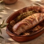 Recette filet mignon au four doré aux herbes de Provence dans un plat en terre cuite